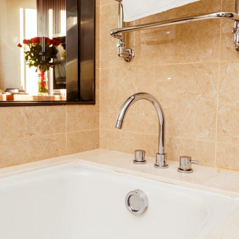 luxury-bath-tub-and-faucet-with-water-